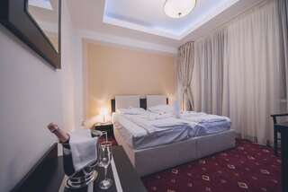 Отель Hotel Bulevard Predeal Предял Двухместный номер с 1 кроватью или 2 отдельными кроватями-1