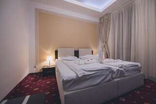 Отель Hotel Bulevard Predeal Предял Двухместный номер с 1 кроватью или 2 отдельными кроватями-2
